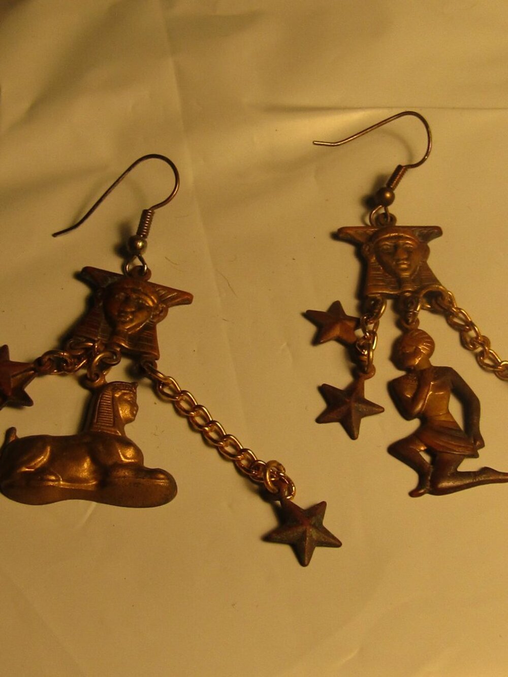 Vintage LONG DANGLE BRASS EGYPTIAN Pierced Earrings sphynx Pharoah Stars etc